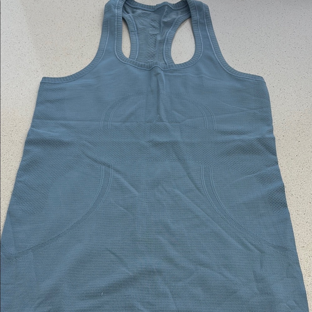 Lululemon swiftly size 4 blue grey color, great condition Women's Blue Tank Top